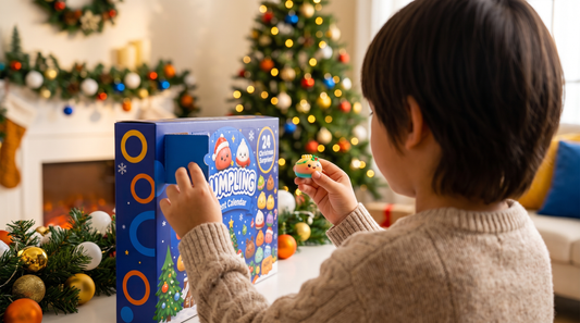 A child opening a door on a Thoson Squishy Advent calendar, holding a small surprise toy.
